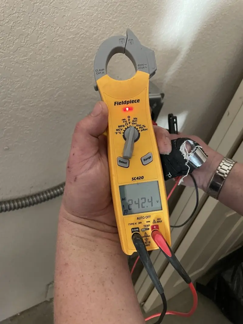 Voltage testing with clamp meter during Hot Tub / Pool Electrical Wiring in Progreso
